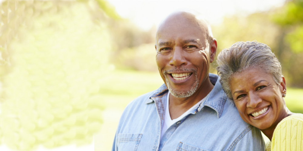 Senior Couple Smiling on Left of Picture